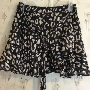 Alter’d State Animal print, faux wrap mini skirt.